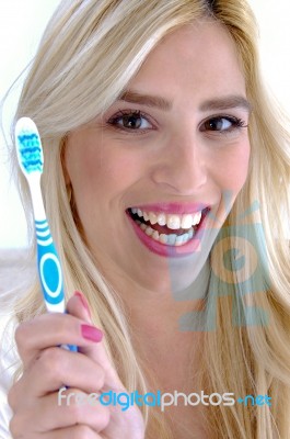 Happy Female Conscious Of Dental Health Stock Photo