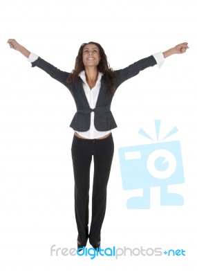 Happy Female Trying To Jump Stock Photo