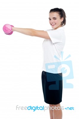 Happy Fitness Girl Lifting Dumbbells Stock Photo