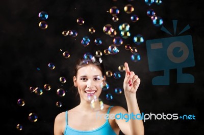 Happy Girl And Soap Bubbles Stock Photo