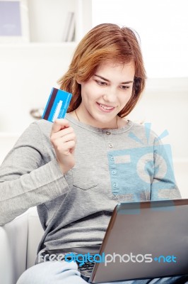 Happy Girl Doing On Line Shopping Stock Photo