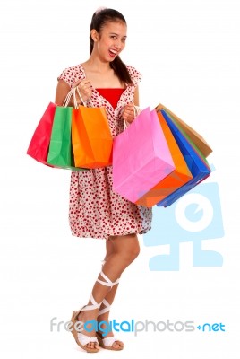 Happy Girl With Her Purchases Stock Photo