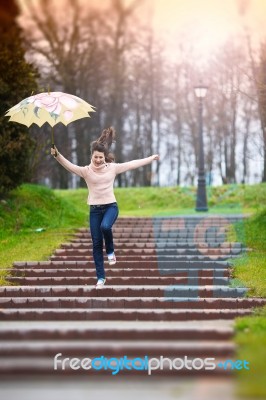 Happy Girl With Umbrella Stock Photo