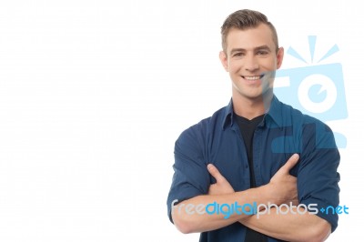 Happy Guy With Folded Arms Stock Photo