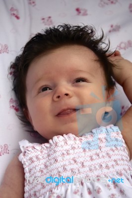 Happy Infant In Crib Stock Photo