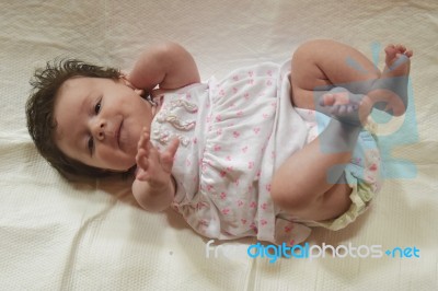 Happy Infant In Crib Stock Photo