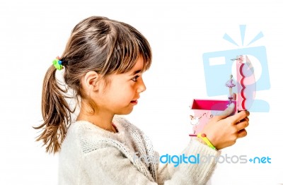 Happy Little Girl Listening The Music From Music Box With Ballerina Isolated On White Stock Photo