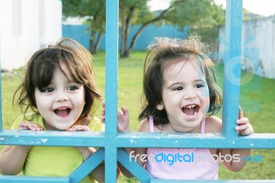 Happy Little Sisters Stock Photo