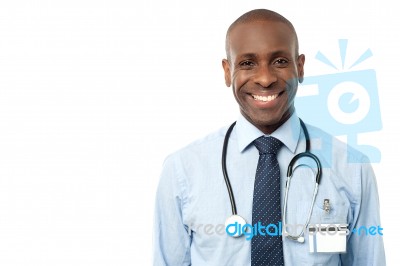 Happy Male Doctor With Stethoscope Stock Photo