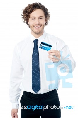 Happy Man Displaying His Cash Card Stock Photo