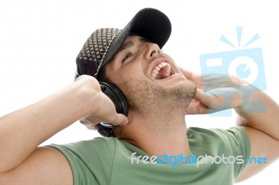 Happy Man Enjoying Music Stock Photo