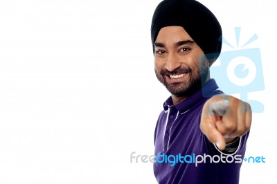 Happy Man Pointing Towards Camera Stock Photo