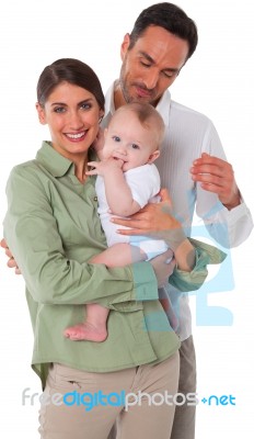 Happy Mother And Father With Baby Boy Stock Photo