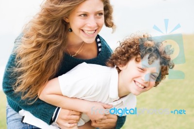 Happy Mother And Son Playing Stock Photo