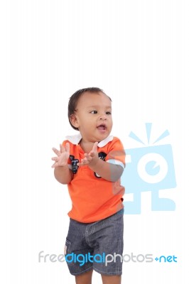 Happy One Year Old Baby Boy Walking On White Background Stock Photo