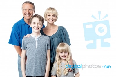 Happy Parents With Their Children Stock Photo