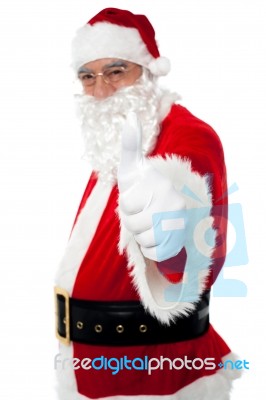 Happy Santa Gesturing Thumbs Up Stock Photo