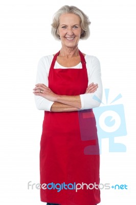 Happy Senior Chef Posing With Confidence Stock Photo