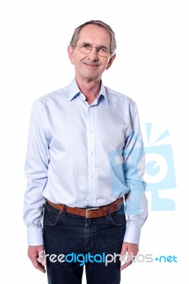 Happy Senior Man Posing To Camera Stock Photo