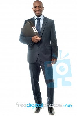 Happy Smiling Businessman With Folder Stock Photo