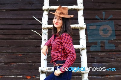 Happy Smiling Girl In Brown Stetson Stock Photo