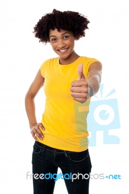 Happy Smiling Lady Showing Thumbs Up Gesture Stock Photo