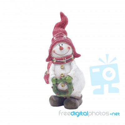 Happy Snowman With Red Hat Holding A Wreath Stock Photo