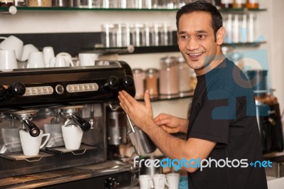 Happy Staff Preparing The Order Stock Photo