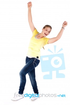 Happy Teen Enjoying Music And Dancing Stock Photo