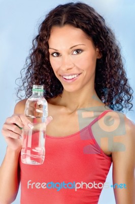 Happy Woman And Bottle Of Water Stock Photo