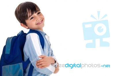 Happy Young Boy Ready For School With His Bag Stock Photo