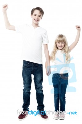 Happy Young Brother And Sister Having Fun Stock Photo