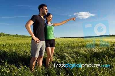 Happy Young  Couple  In The Countryside Stock Photo