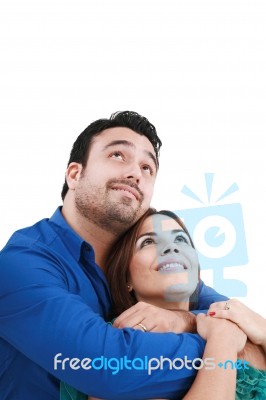 Happy Young Couple Looking Up Stock Photo