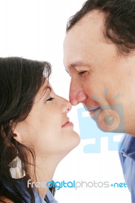 Happy Young Couple Portrait Smiling Isolated Over A White Backgr… Stock Photo