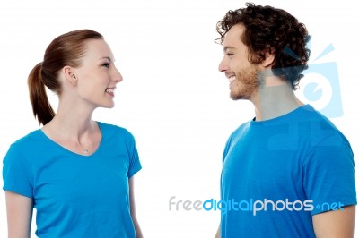 Happy Young Couple Posing Casually Stock Photo