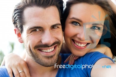 Happy Young Couple Taking Selfies With Her Smartphone In The Par… Stock Photo