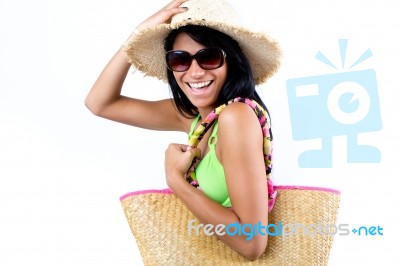 Happy Young Girl With Hat And Green Bikini Stock Photo