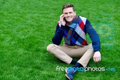 Happy Young Man Communicating, Posing Outdoors Stock Photo