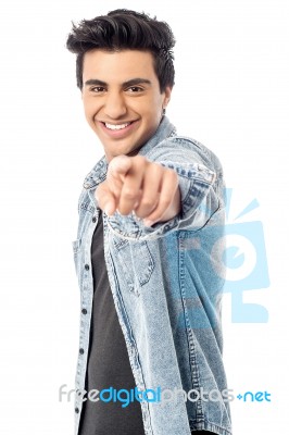 Happy Young Man Pointing At You Stock Photo