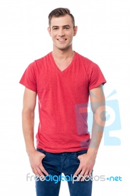 Happy Young Man Posing Casually Stock Photo