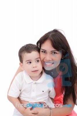 Happy Young Mother And Her Son Posing Together. Isolated Over Wh… Stock Photo