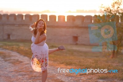 Happy Young Women Gives You A Kiss Stock Photo