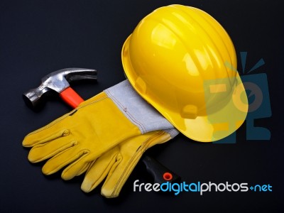 Hard Hat Hammer And Gloves Stock Photo