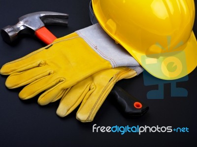 Hard Hat Hammer And Gloves Stock Photo