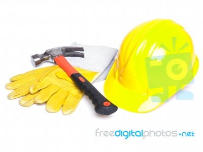 Hard Hat Hammer And Leather Gloves Stock Photo