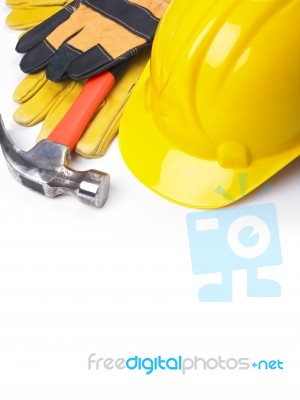 Hard Hat Hammer And Leather Gloves Stock Photo