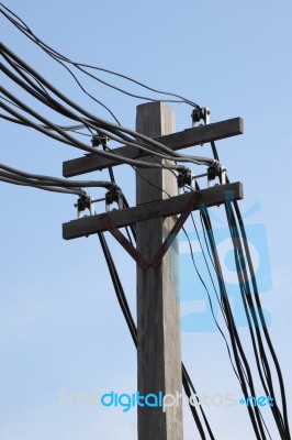 Hard Wire On Electric Pole In Blue Sky Stock Photo