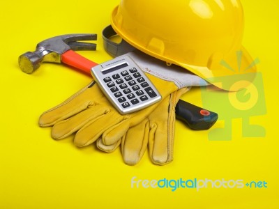 Hat Hammer Calculator and Gloves Stock Photo