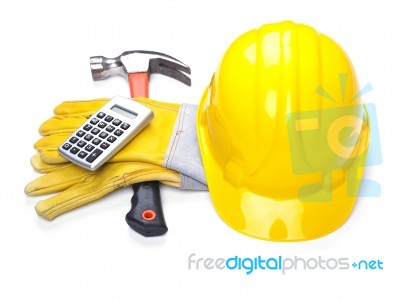 Hat Hammer Calculator And Gloves Stock Photo